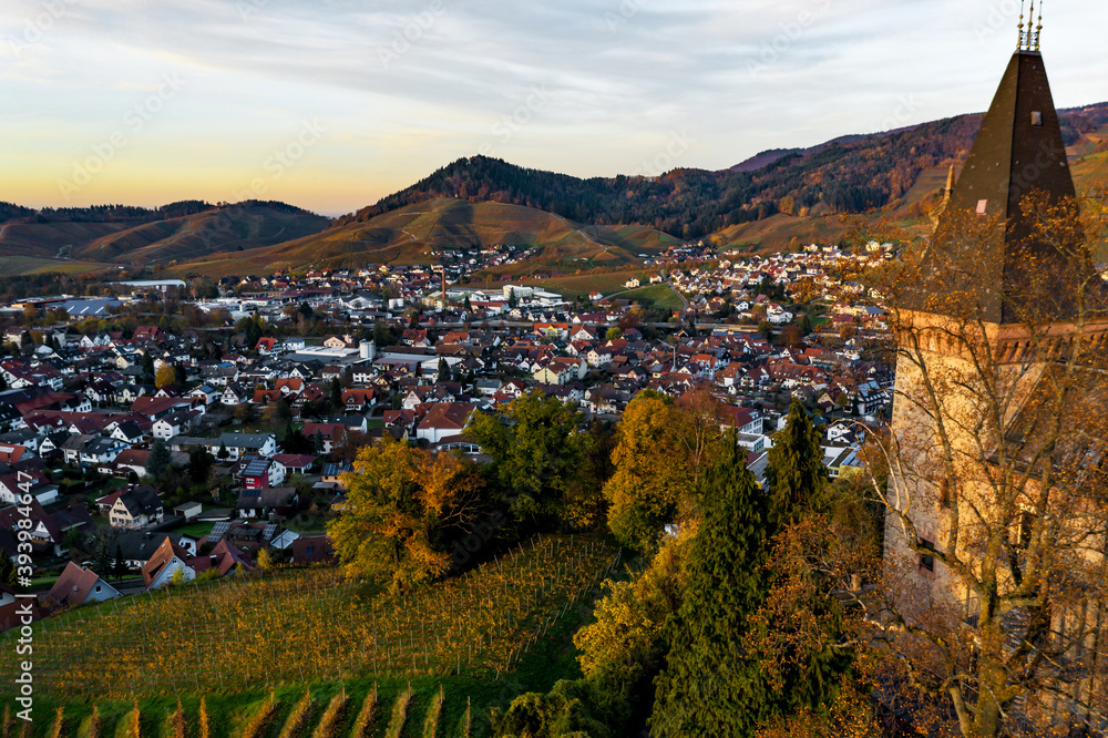 Obraz premium Colorful landscape aerial view of little village Kappelrodeck in Black Forest mountains. Beautiful medieval castle Burg Rodeck.