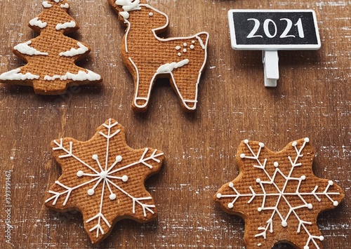 2021 sweet Christmas cookies on brown background with 2021 chalkboard for your text and logo