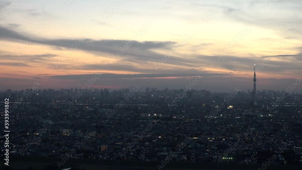 TOKYO, JAPAN : Aerial sunrise CITYSCAPE of TOKYO and MOUNT FUJI. View of rising sun and buildings at downtown. Japanese city life and nature concept. Time lapse zoom in shot night to morning. TOKYO, JAPAN : Aerial sunrise CITYSCAPE of TOKYO and MOUNT FUJI. View of rising sun and buildings at downtown. Japanese city life and nature concept. Time lapse zoom in shot night to morning.