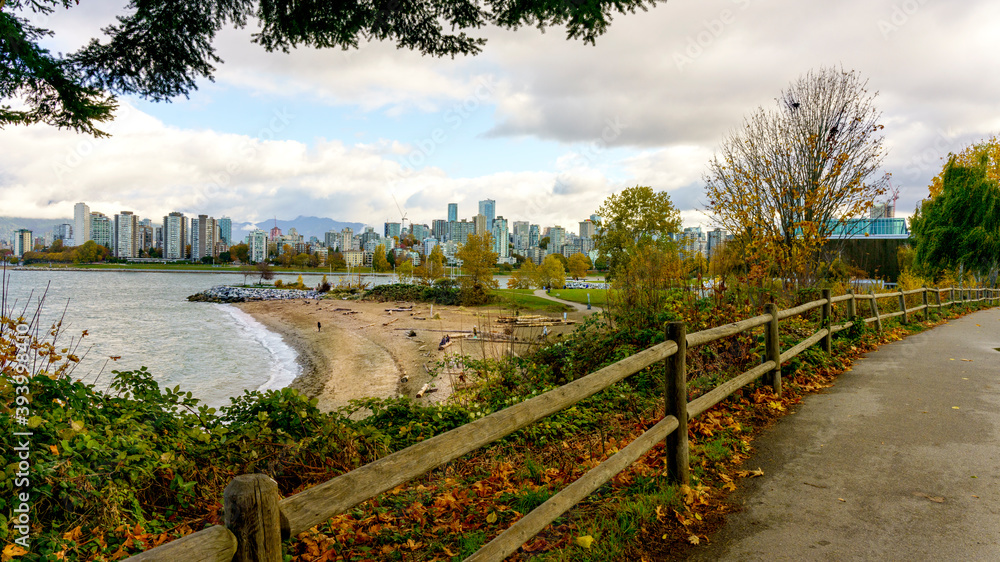 Pedestrian walkway overlooking BC beach and ocean on a fall day