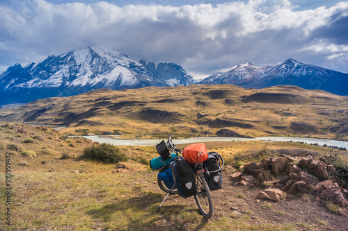 Torres del Paine National Park / Magallanes y la Antártica Chilena Region / Chile - March 29, 2018: Bicycle tour going through the park.