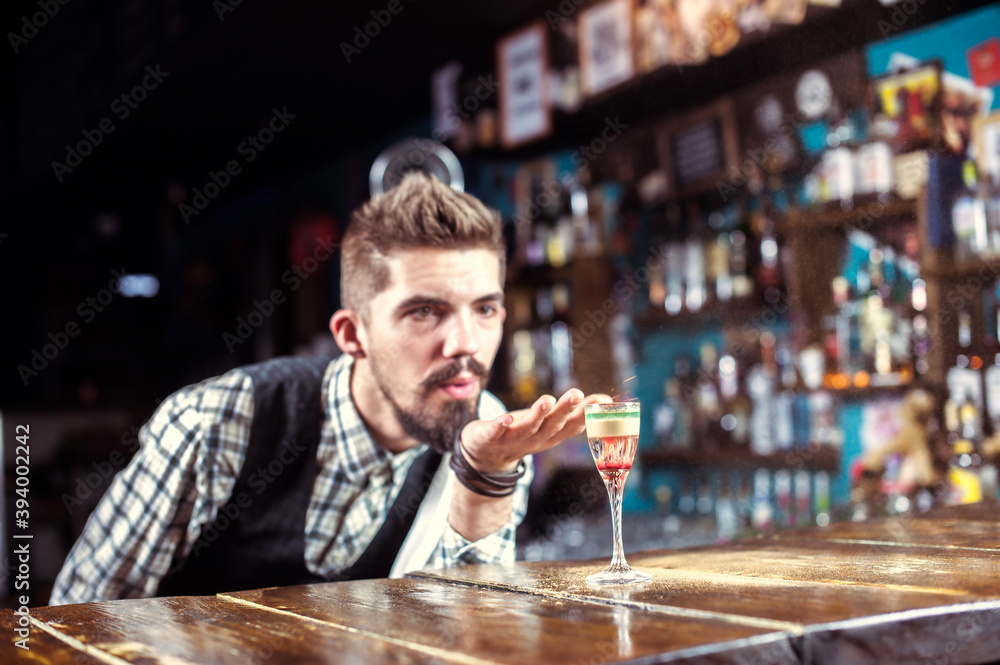 Bartender concocts a cocktail on the beerhall