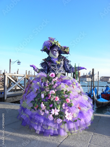 Violet costume, venetian city carnival mask © damaisin1979