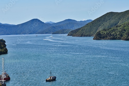 Landscape with Boats on a Mountainous Coastline in New Zealand
