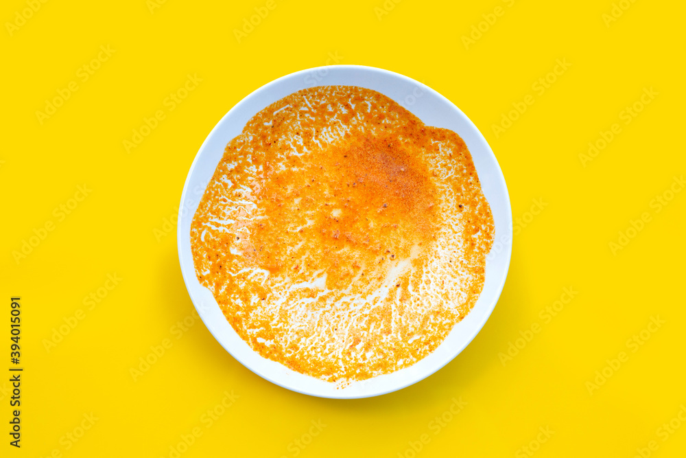 Dirty dishes on yellow background. Top view Dirty dishes on yellow background. Top view