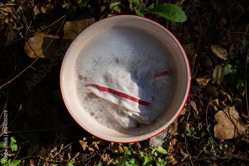 bowl with soap and rag