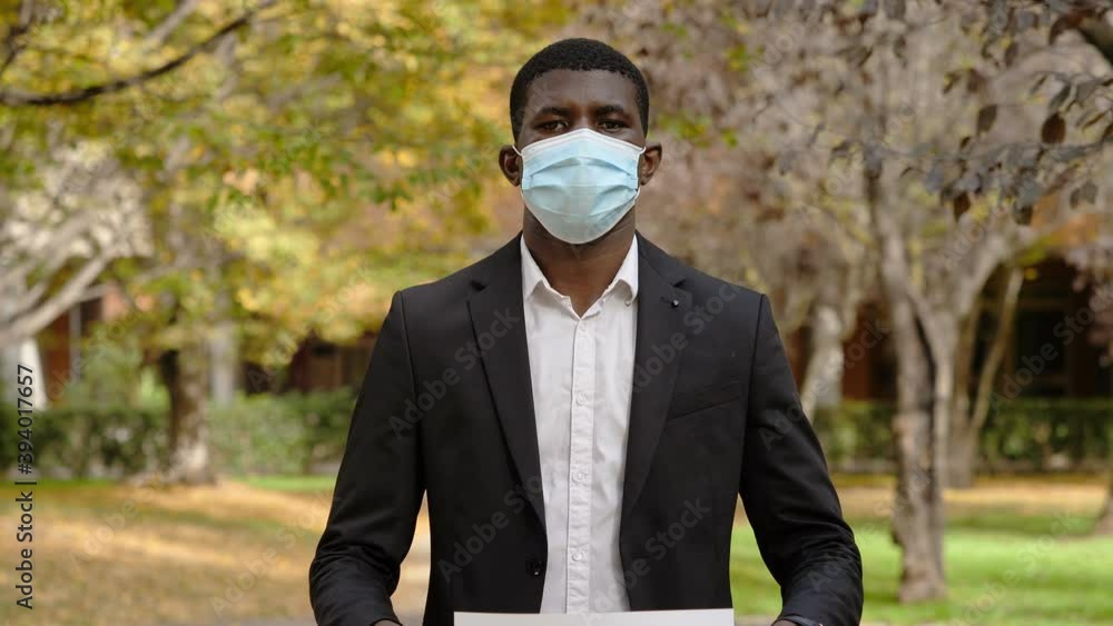 support doctors during the covid - black man shows signs in support of the NHS support doctors during the covid - black man shows signs in support of the NHS