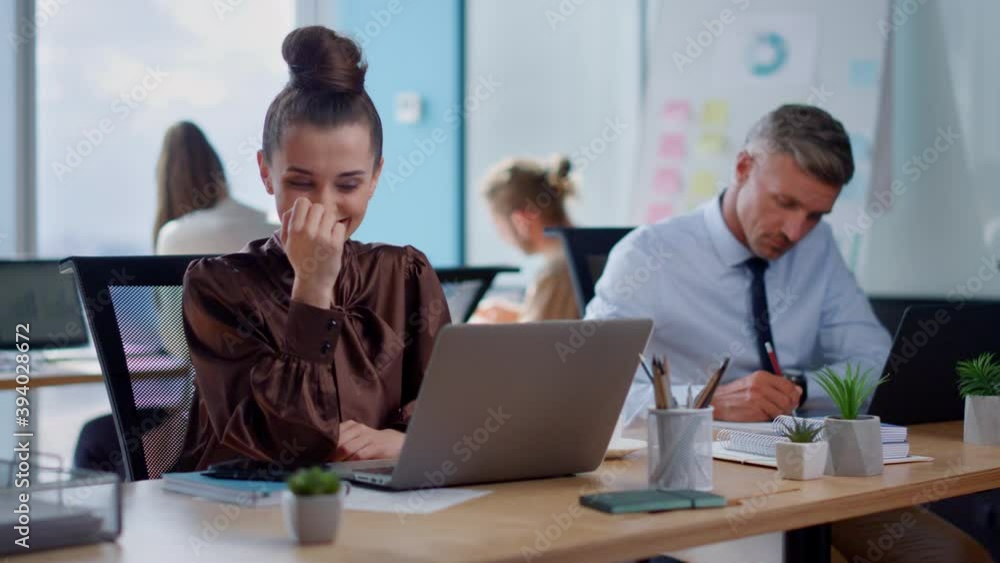 Businesswoman video chatting on laptop. Worker video calling on laptop camera Businesswoman video chatting on laptop. Worker video calling on laptop camera
