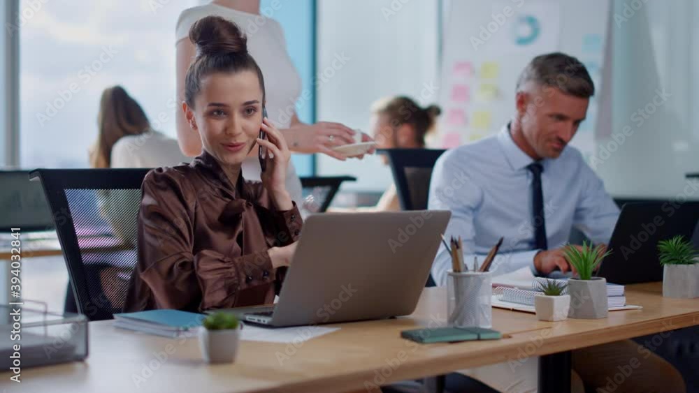 Smiling businesswoman talking on smartphone. Business woman calling on cellphone Smiling businesswoman talking on smartphone. Business woman calling on cellphone