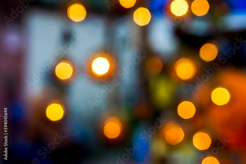 Abstract blurred and bokeh of party light bubs reflection lighting at night time and blurry background.