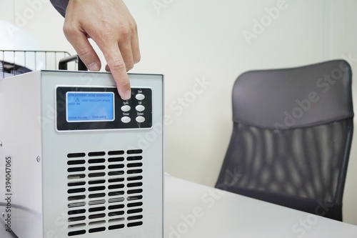 Foto Ozone generators placed on the table in office room to cleaning and disinfection during corona-virus epidemic