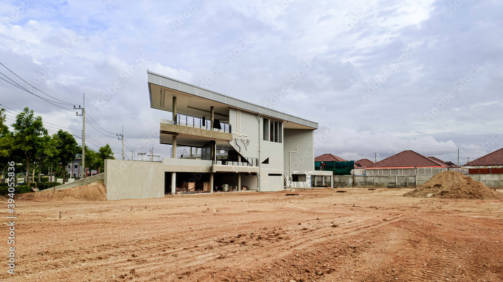 Unfinished building of house. Construction site of house with landscape mountain background, Background of building for business concept, Civil engineering work Unfinished building of house. Construction site of house with landscape mountain background, Background of building for business concept, Civil engineering work
