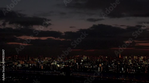 Wallpaper Mural TOKYO, JAPAN : Aerial high angle sunrise CITYSCAPE of TOKYO. View of central downtown area around Minato ward. Japanese urban metropolis concept. Long wide time lapse tracking shot night to morning. Torontodigital.ca