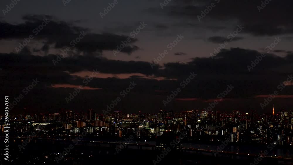 TOKYO, JAPAN : Aerial high angle sunrise CITYSCAPE of TOKYO. View of central downtown area around Minato ward. Japanese urban metropolis concept. Long wide time lapse tracking shot night to morning. TOKYO, JAPAN : Aerial high angle sunrise CITYSCAPE of TOKYO. View of central downtown area around Minato ward. Japanese urban metropolis concept. Long wide time lapse tracking shot night to morning.