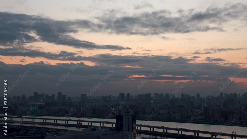 TOKYO, JAPAN : Aerial high angle sunrise CITYSCAPE of TOKYO. View of central downtown area around Minato ward. Japanese urban metropolis concept. Long wide time lapse tracking shot night to morning. TOKYO, JAPAN : Aerial high angle sunrise CITYSCAPE of TOKYO. View of central downtown area around Minato ward. Japanese urban metropolis concept. Long wide time lapse tracking shot night to morning.