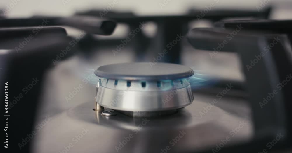Gas stove burner start blue flame coffee pot put on close up kitchen Gas stove burner start blue flame coffee pot put on close up kitchen