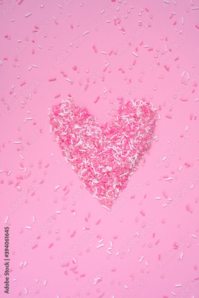  heart  pink. Valentine's day holiday. Symbol of love, romance, family and fidelity.Sweet edible heart made from  sugar decor on a pink background.