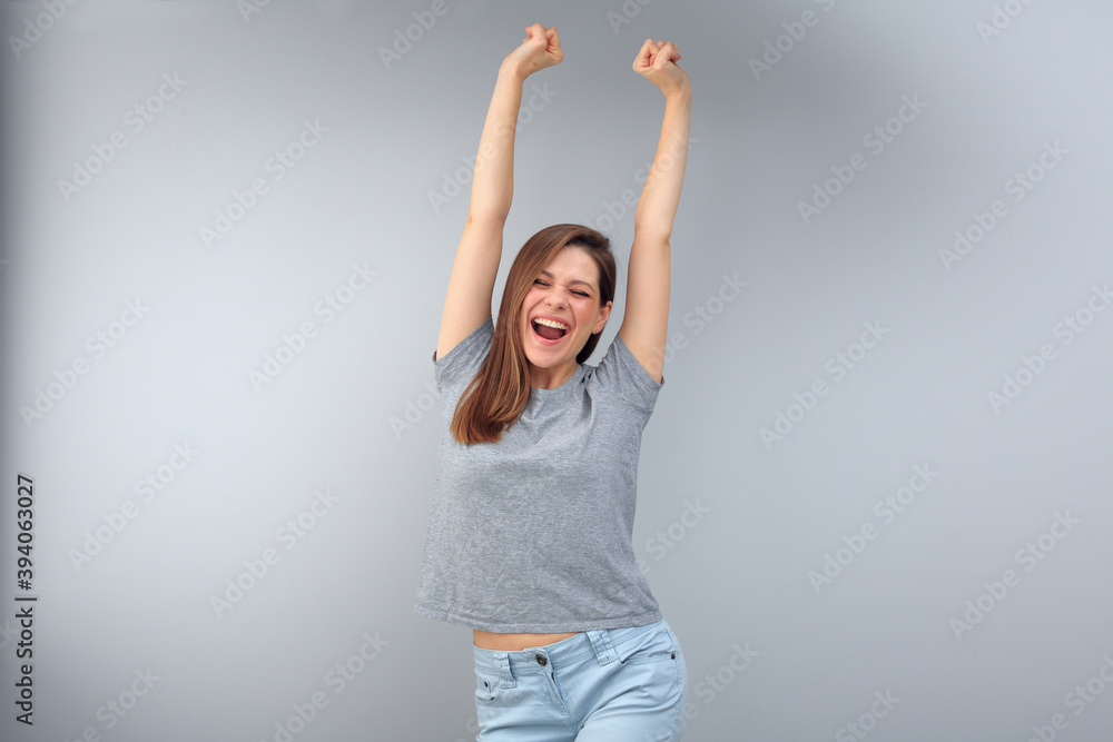 Happy emotional woman wearing gray t shirt with copy space.