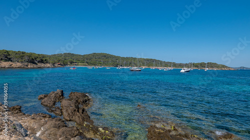 Discovery of the island of Porquerolles in summer. Deserted beaches and pine trees in this landscape of the French Riviera