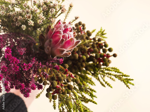 Fototapeta Naklejka Na Ścianę i Meble -  Beautiful autumn flowers bouquet in female hand. Closeup