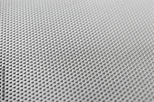 Abstract grey plastic background. Close up.