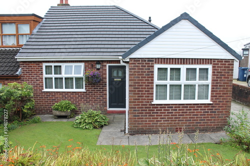 English house with small front garden, bungalow single story
