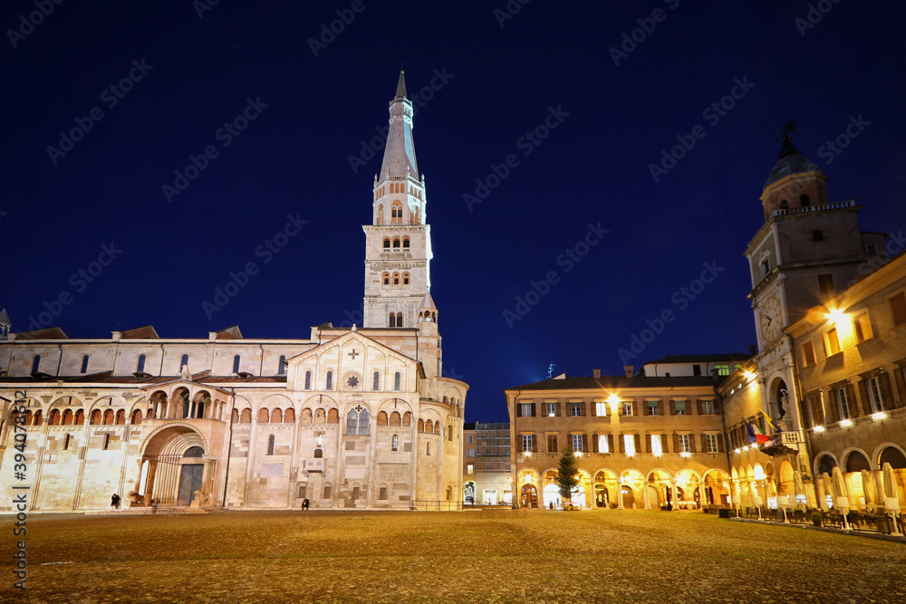 Modena, night view of Piazza Grande, Modena city, Duomo and Ghirlandina tower, Unesco world heritage site