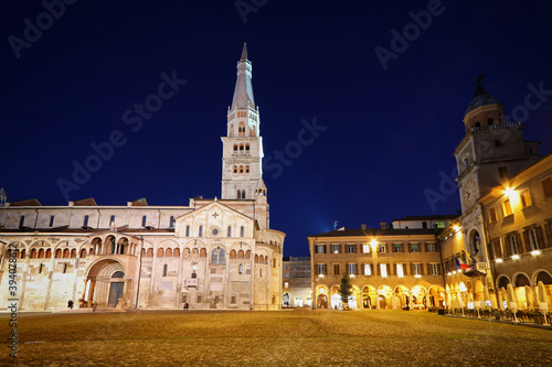 Modena, night view of Piazza Grande, Modena city, Duomo and Ghirlandina tower, Unesco world heritage site