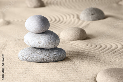 Circles on the sand and round stones in the rock garden  for relaxation and spiritual harmony