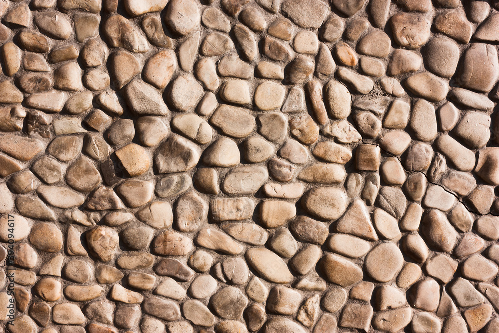 Background from brown small rounded stones. Background from brown small rounded stones.