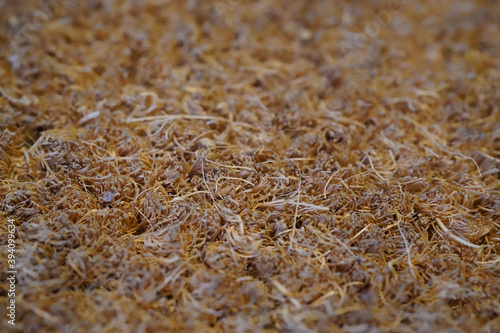 brown wicker mat and carpet background