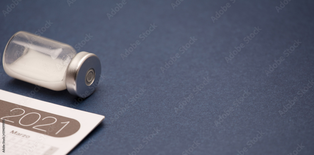 Naklejka premium vaccine canister, with calendar 2021, blue background