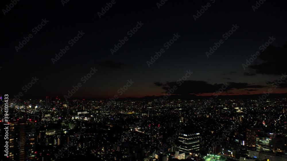 TOKYO, JAPAN : Aerial high angle sunrise CITYSCAPE of TOKYO. View of buildings around Shinjuku and Nakano ward, shot from Ikebukuro city. Long time lapse shot night to morning. TOKYO, JAPAN : Aerial high angle sunrise CITYSCAPE of TOKYO. View of buildings around Shinjuku and Nakano ward, shot from Ikebukuro city. Long time lapse shot night to morning.