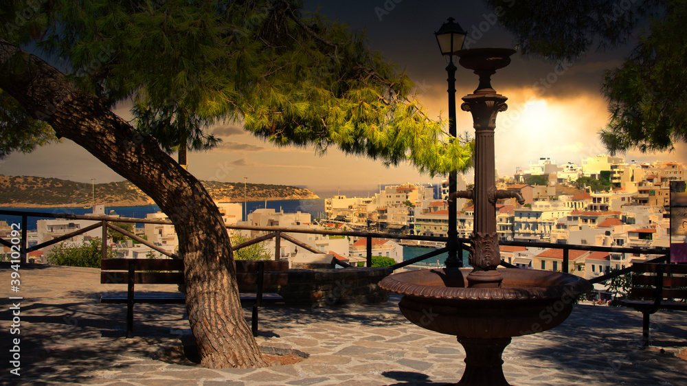 The famous viewpoint over the small harbor and lake in Agios Nikolaos on the island of Crete