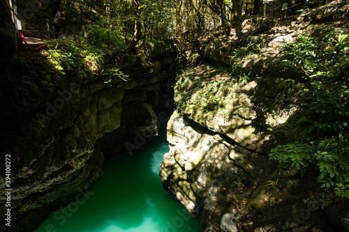 canyon with blue water and white rocks