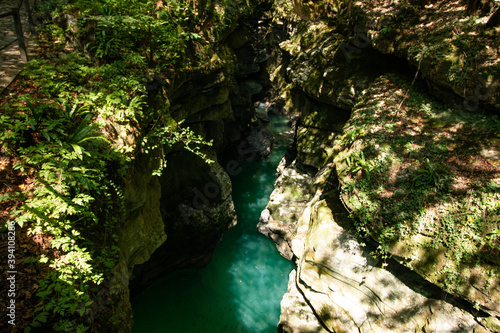 canyon with blue water and white rocks