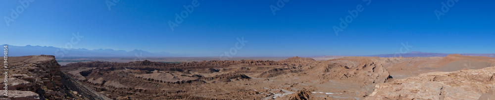 Panorama of stone cliff in Atacama salt desert landscape, Chile