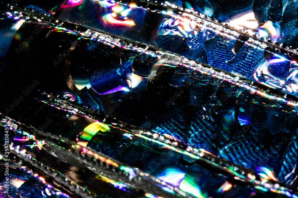 Broken CD Cut Up To Make Abstract Holographic Background Broken CD Cut Up To Make Abstract Holographic Background