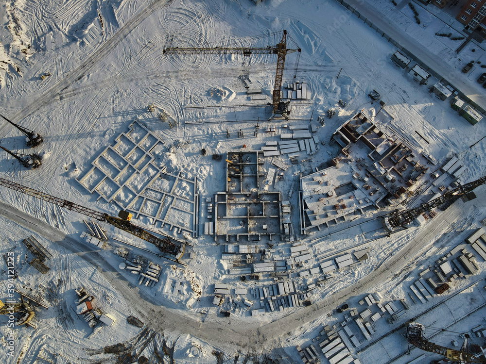 Fototapeta premium Winter construction of new houses