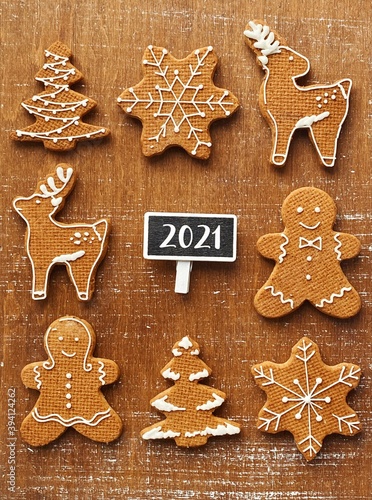 Merry Christmas homemade figures covered by icing-sugar for 2021 new year wallpaper