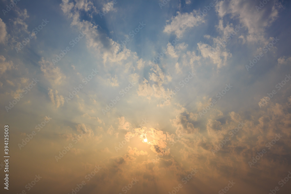The sky is covered with clouds and the sun's rays penetrate The sky is covered with clouds and the sun's rays penetrate