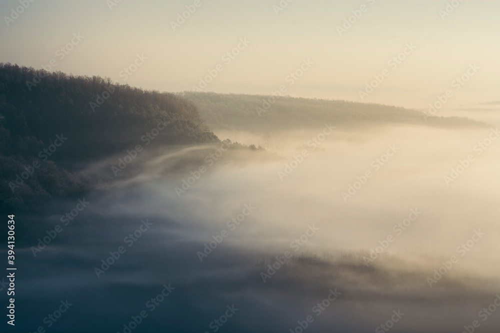 Ethereal morning landscape with fog and sun light Ethereal morning landscape with fog and sun light