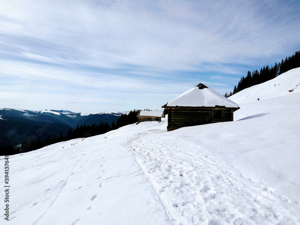 Fototapeta premium Wooden shepherd's hut in the mountains