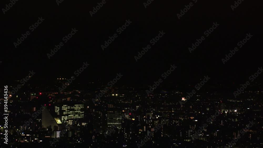 TOKYO, JAPAN : Aerial high angle sunrise CITYSCAPE of TOKYO and MOUNT FUJI. Huge sun going up behind mountains. Japanese city life and nature concept. Long time lapse zoom in shot night to morning. TOKYO, JAPAN : Aerial high angle sunrise CITYSCAPE of TOKYO and MOUNT FUJI. Huge sun going up behind mountains. Japanese city life and nature concept. Long time lapse zoom in shot night to morning.