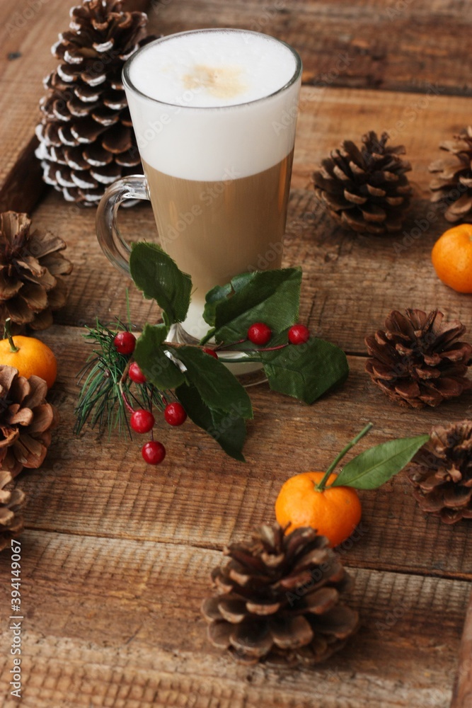 Coffee latte and forest cones on the table Coffee latte and forest cones on the table