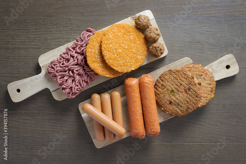 Flat lay of plant based vegetarian meat products. burgers sausage