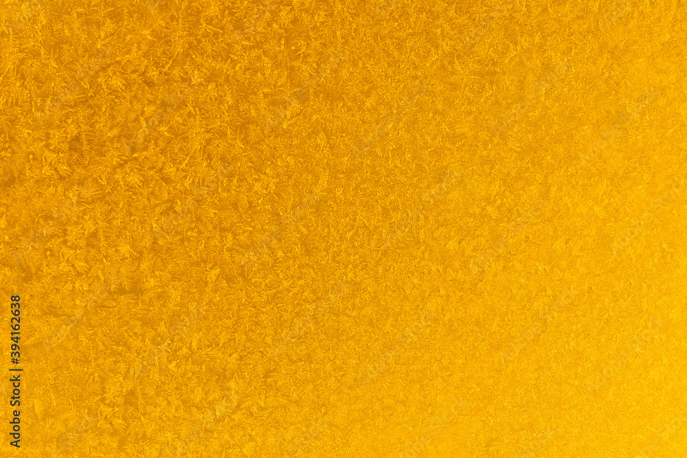 yellow frost on a glass background. texture patterned frosted glass. yellow frost on a glass background. texture patterned frosted glass.