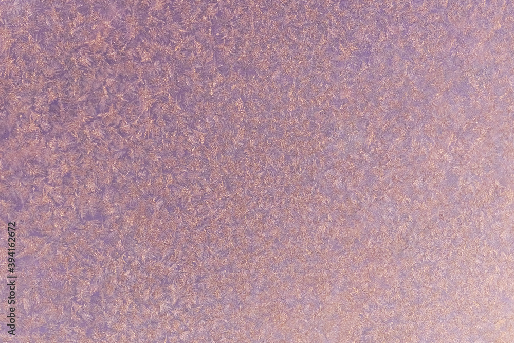 Fototapeta premium pink frost on a glass background. texture patterned frosted glass.