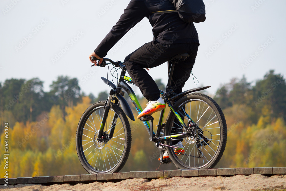 Fototapeta premium Young fit man during a bike ride
