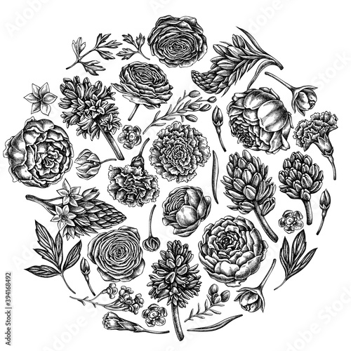 Round floral design with black and white peony, carnation, ranunculus, wax flower, ornithogalum, hyacinth